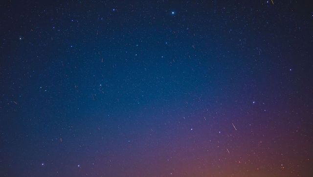 Dreamy Night Sky with Stars and Subtle Horizon Glow