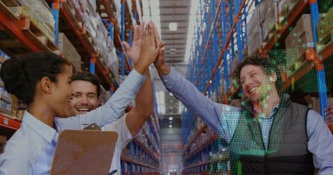 Diverse Team High-fiving in Modern Warehouse - Download Free Stock Images Pikwizard.com