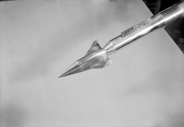 Aerospace engineers and enthusiasts can use this image to study aerodynamic shapes and aircraft testing methods. Ideal for educational materials related to aerospace engineering, aerodynamic testing, and historical aviation projects. Useful in articles and presentations on the development of spacecraft and high-speed jets.