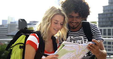 Young Travelers Exploring City with Map Outdoors - Download Free Stock Images Pikwizard.com