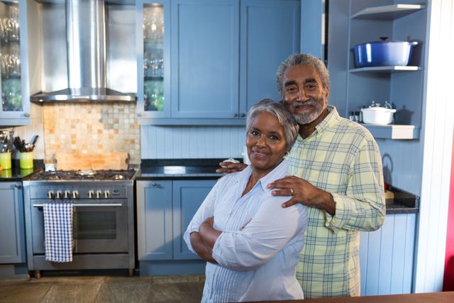 Portrait of senior couple in kitchen - Download Free Stock Photos Pikwizard.com