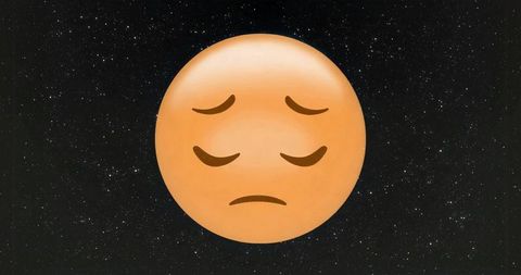 Pensive emoji in cosmic galaxy with starry backdrop