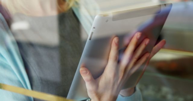 Closeup of Woman Using Digital Tablet in Cafeteria - Download Free Stock Images Pikwizard.com