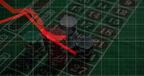 Financial loss concept with downturn graph and roulette table