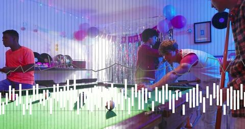 Young men playing pool at vibrant basement party with disco lights and balloons