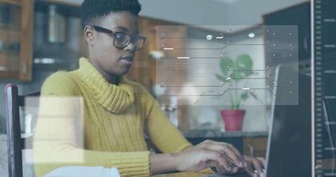 Focused Woman with Laptop and Futuristic Digital Interface