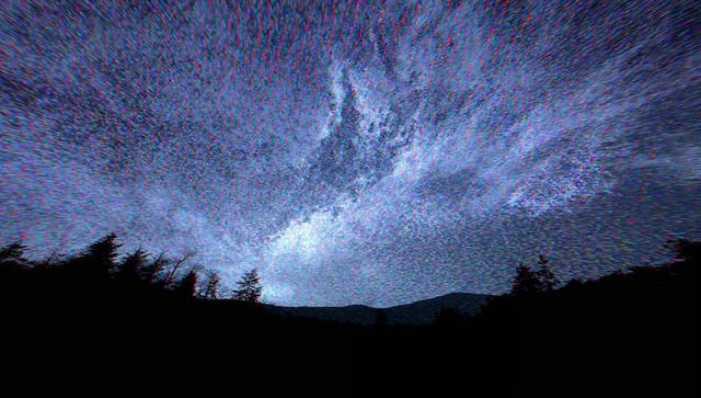 Ethereal Starry Night Sky Over Forest Silhouette