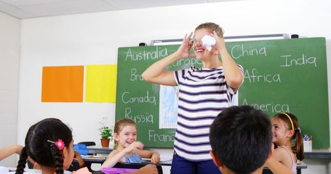 Playful Classroom Interaction with Engaged Elementary Students - Download Free Stock Images Pikwizard.com