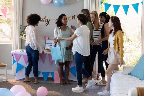 Diverse Friends Celebrating Baby Shower at Home