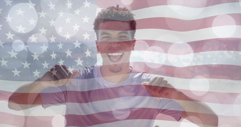 Joyful Young Man Dancing with American Flag Overlay at Beach - Download Free Stock Images Pikwizard.com