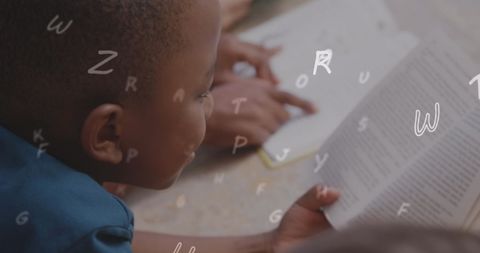 Young Boy Immersed in Reading, Education and Learning Focus