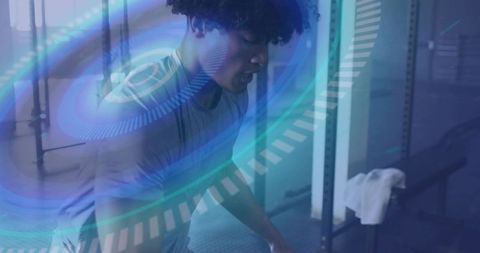 Athletic Man Weightlifting in Gym with Futuristic Digital Overlay