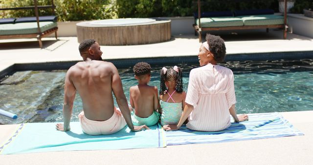 Family Relaxing by Swimming Pool Together in Summer - Download Free Stock Images Pikwizard.com