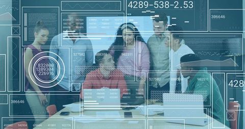 Team Collaborating on Digital Innovation with Data Displays