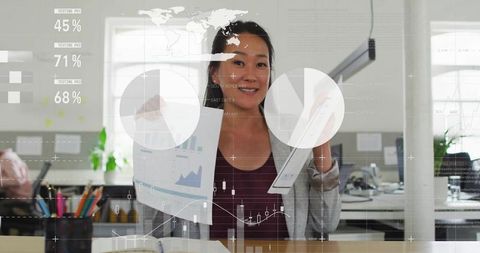 Businesswoman presenting analytical data in modern office