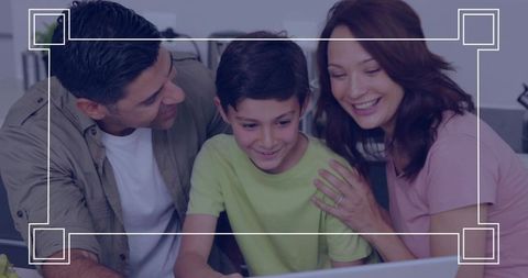 Smiling parents and son bonding over laptop at home, leaning toward screen, cozy moment