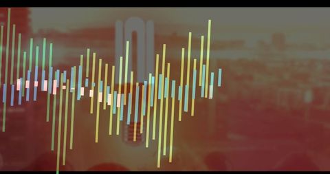 Colorful sound waves overlay urban cityscape at sunset