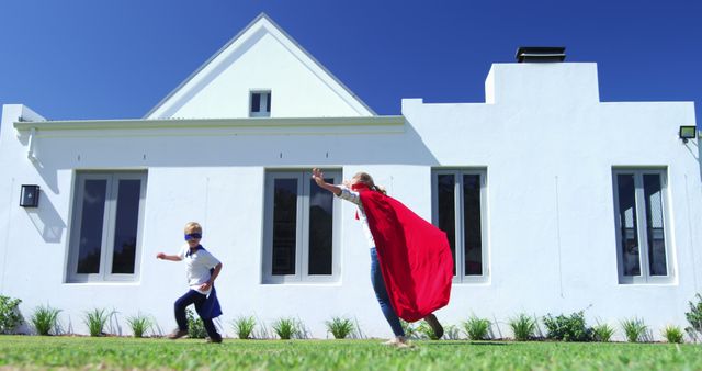 Children Playing Superheroes Outside Modern White House - Download Free Stock Images Pikwizard.com