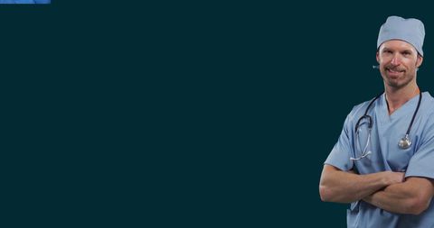 Confident doctor in scrubs with folded arms