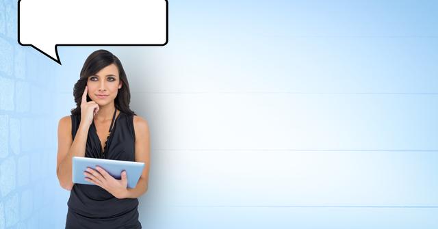 Digital composite of Woman holding tablet PC with speech bubble over head