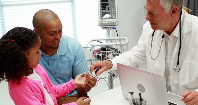 Pediatrician Checking Blood Sugar Levels of Child with Parent Nearby at Medical Clinic - Download Free Stock Images Pikwizard.com