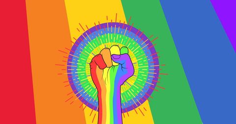 Rainbow Fist With Equality Symbol Against Vibrant Backdrop
