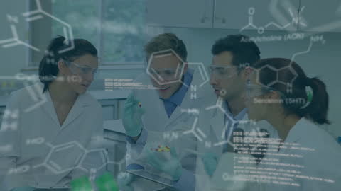 Scientists Discussing Research with Digital Molecule Projections