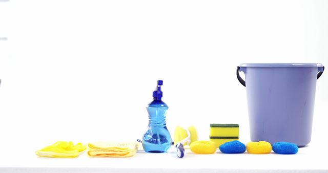 House Cleaning Supplies Laid Out on White Surface - Download Free Stock Images Pikwizard.com
