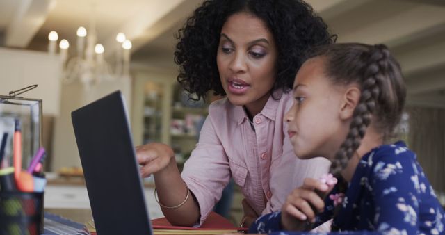 Mother Helping Daughter with Homework on Laptop at Home - Download Free Stock Images Pikwizard.com