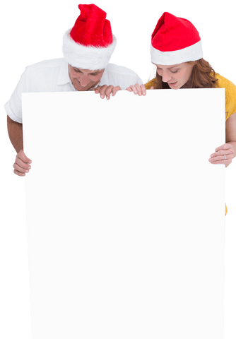 festive couple holding transparent christmas holiday poster - Download Free Stock Videos Pikwizard.com