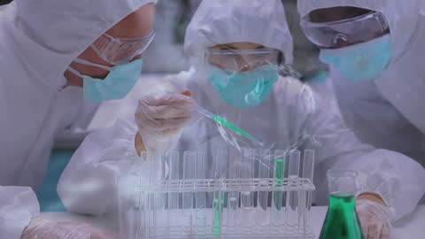 Scientists in Protective Gear Conducting Laboratory Experiments