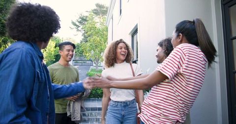 Diverse Friends Celebrating at a Warm Home Gathering