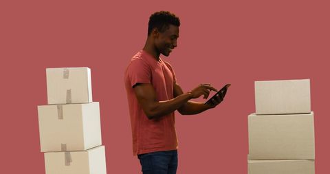 Man Managing Inventory with Tablet and Delivery Boxes - Download Free Stock Images Pikwizard.com