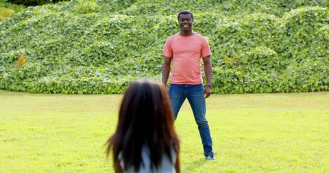 Father and Daughter Bonding in Sunlit Garden