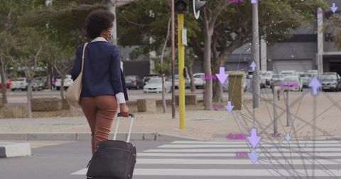 Professional Walking Across Street with Digital Analytics Overlay