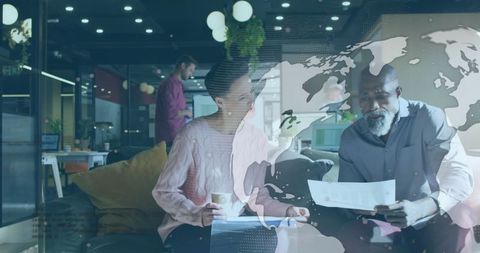 Collaborative Team Analyzing Documents in Futuristic Office