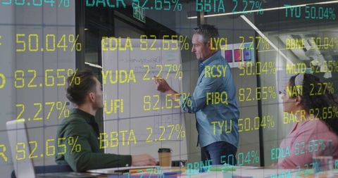 Diverse team meeting with overlaid stock market data