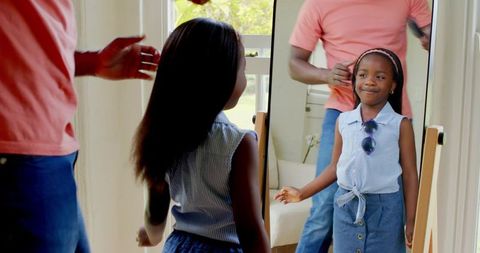 Father and Daughter Bonding Moment During Hair Styling
