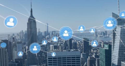 Cityscape overlaid with global network of profile icons