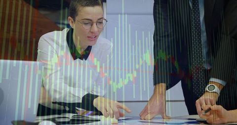 Business Colleagues Analyzing Financial Data and Charts