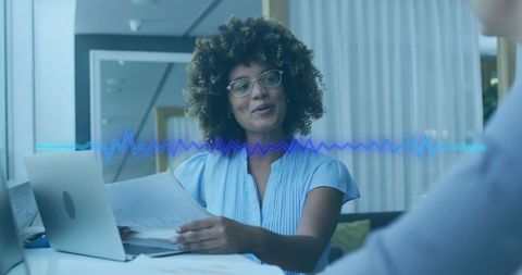 Professional Woman Collaborating in Modern Office Setting