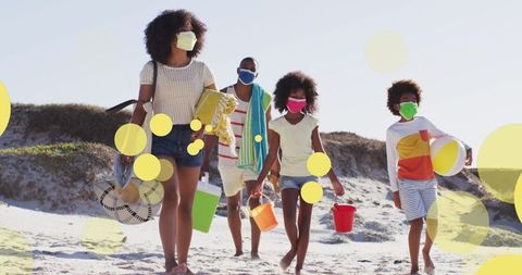 Family Beach Outing with Face Masks and Beach Supplies