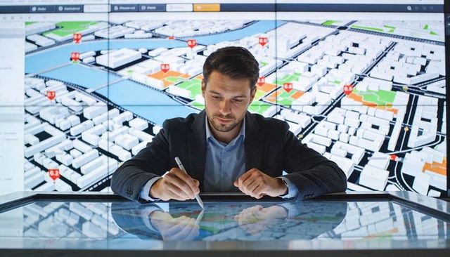Analyzing 3D City Map on Interactive Touch Table for Urban Planning and GIS Visualization