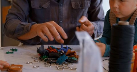 Creative Crafts at Home: Father and Children Engaging in DIY Project - Download Free Stock Images Pikwizard.com