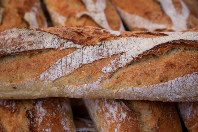 Close-up of Freshly Baked Baguettes with Crusty Texture - Download Free Stock Photos Pikwizard.com