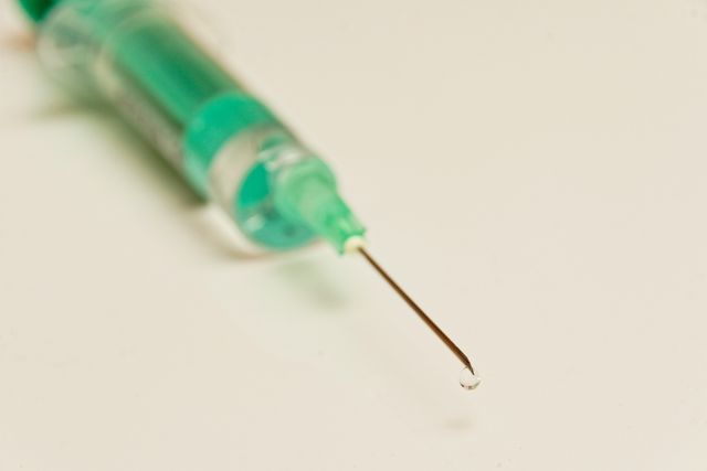Close-Up of Syringe Needle with Liquid Drop - Download Free Stock Photos Pikwizard.com