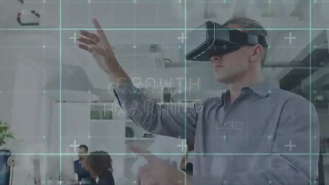 Businessman Utilizing VR for Data Visualization in Office