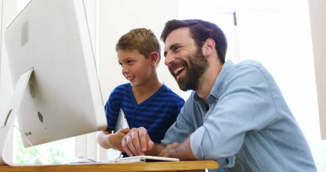 Father and Son Enjoying Time on Computer - Download Free Stock Images Pikwizard.com