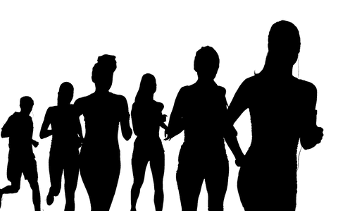 Transparent silhouette of female runners running for competition