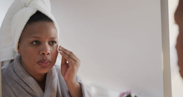 Woman Applying Skincare in Mirror After Shower - Download Free Stock Images Pikwizard.com